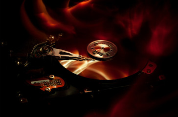 computer hard drive and abstract background fire