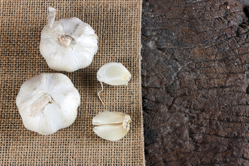 Garlic cloves on old wood