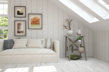 White interior design with sofa and green landscape in window