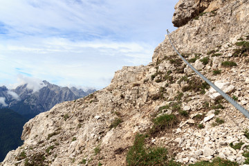 Via Ferrata Severino Casara cable and Sexten Dolomites mountain panorama in South Tyrol, Italy