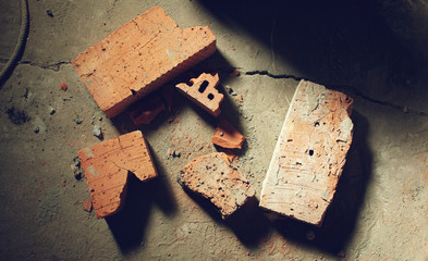 Broken bricks at the construction site - top view
