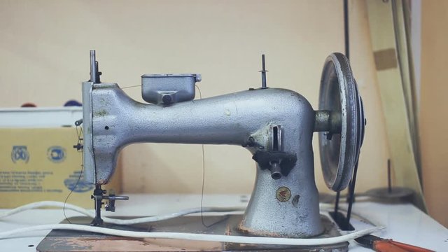 old sewing machine. manufacture of wearing apparel