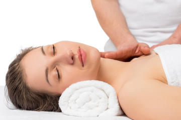 Fototapeta na wymiar serene girl on procedure of massage, face and neck