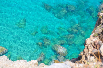 Naklejka na ściany i meble turquoise sea and rocks
