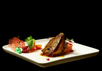 Grilled meat fillet on pear