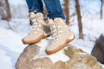 Close-up of hiking boots in the snow