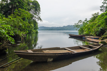 Traditional wooden fisher boat anchored at Barombi Mbo crater lake in Cameroon, Africa