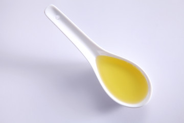 spoon of oil