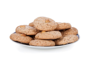 Almendrados, a typical and traditional almond biscuit from the Algarve region of Portugal, on a plate and isolated on white background