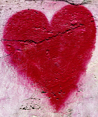 Red heart on the wall