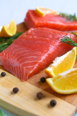Fish, salmon, halibut and lemon closeup