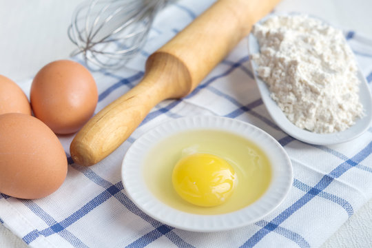 Eggs and flour ingredients like baking, culinary background