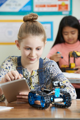 Pupils In Science Lesson Studying Robotics