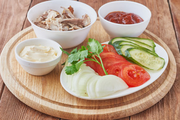Prepared foods for doner kebab with tomatoes, meat and greens.