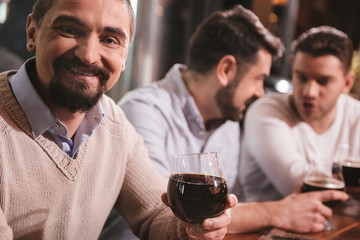Cheerful bearded man smiling