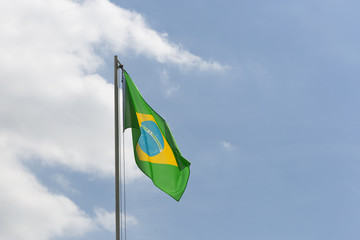 National flag of Brazil on a flagpole