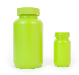 Two green plastic bottles-one tall, the other shorter. White background. Horizontal.