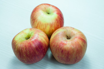 Apple on a wooden white. apple isolated. 