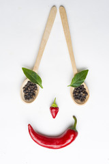 red and green hot chili pepper on a white background 
