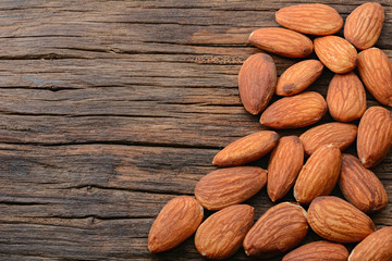almonds on old wooden table