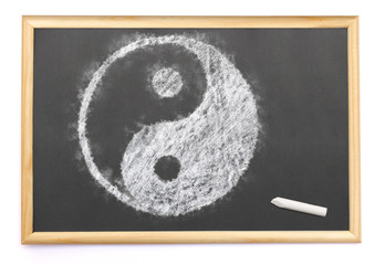  a Ying Yang symbol drawn on a blackboard with chalk.(series)