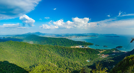 Panoramic view of blue sky, sea and mountain seen from Cable Car viewpoint, Langkawi Island, Malaysia.