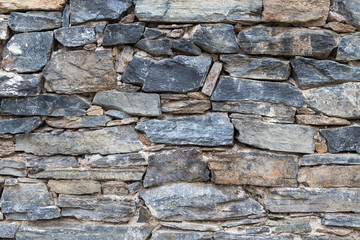 Stone wall. Outdoor background natural stone.