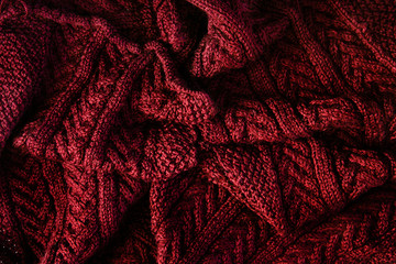 Texture knitted scarf burgundy - cozy warm background