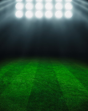 Fototapeta Illuminated football field at night