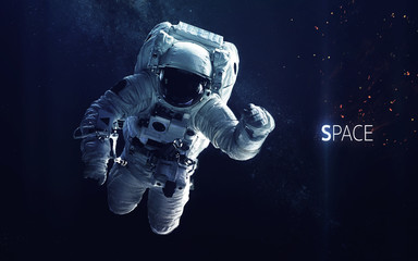 Fototapeta na wymiar Astronaut at spacewalk. Cosmic art, science fiction wallpaper. Beauty of deep space. Billions of galaxies in the universe. Elements of this image furnished by NASA