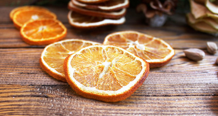 Winter decorations with dried fruit and citrus, thuja 