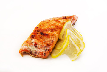 piece of fish with lemon