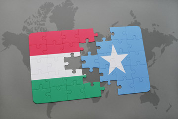 puzzle with the national flag of hungary and somalia on a world map