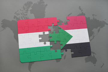 puzzle with the national flag of hungary and sudan on a world map