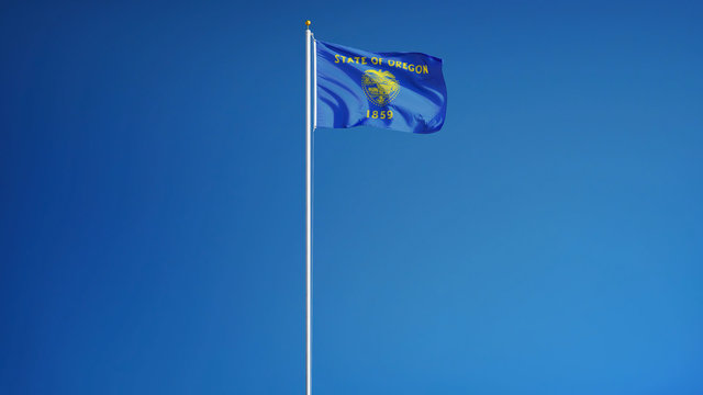 Oregon (U.S. state) flag waving against clear blue sky, long shot, isolated with clipping path mask alpha channel transparency, perfect for film, news, composition