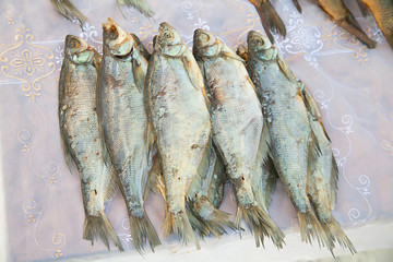Dried fish on the table.