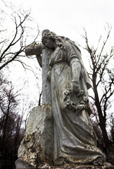 Old cemetery marble sculpture of the woman