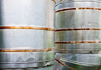 Close up of two vertical metal pipelines
