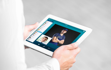 Man video conferencing on tablet. Online car service concept.