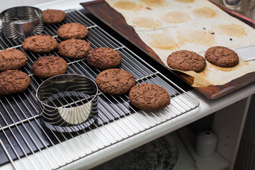 baked chocolate cookies laying on a rack