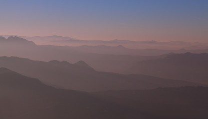Mountains, fog and sunset.