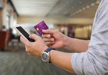 Online payment,The people hands holding a credit card and using