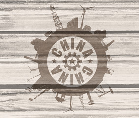 Circle with industry relative silhouettes. Objects located around the circle. Industrial design background. China text in the center. Wood texture.