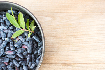 Berries of a honeysuckle on in the Cup