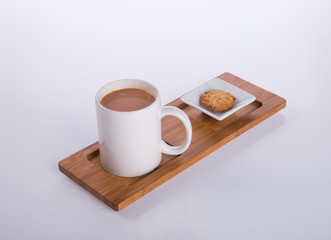 coffee or coffee with cookies on background.