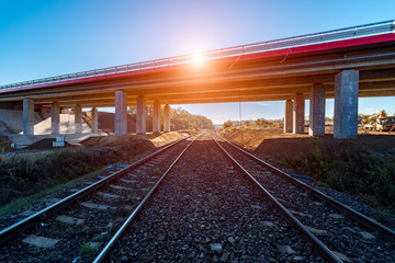 Obraz premium Sunset over the bridge in the city
