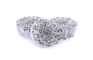 peeled and cut fresh dragon fruit on white background