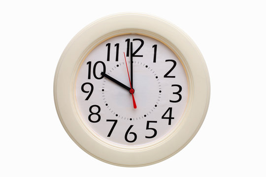 White analog wall clock showing ten o'clock