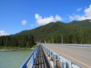 the railing of the bridge over the Katun river in the Altai mountains