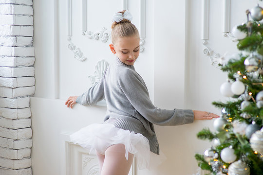 Young ballet dancers learning the lesson near Christm